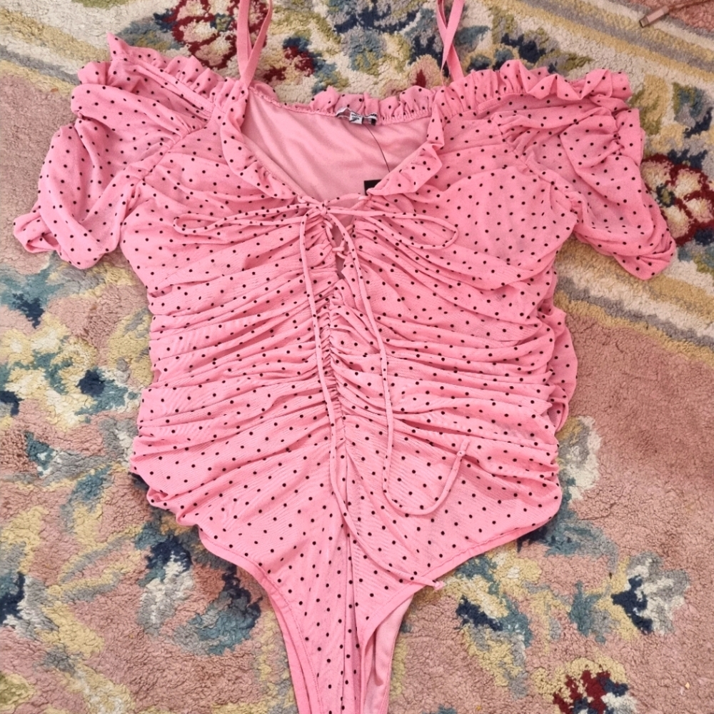 Pink polkadot bodysuit